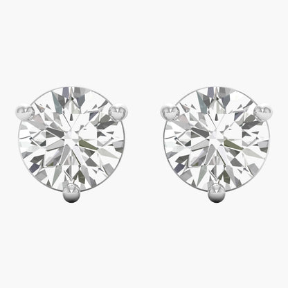 Pair of diamond stud earrings on a white background