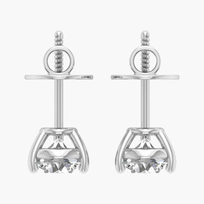 Pair of silver earrings with clear gemstones on a white background