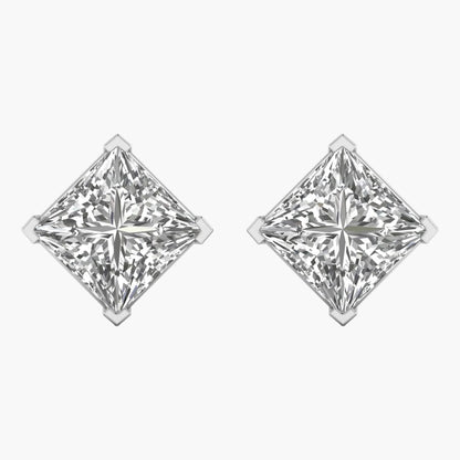 Pair of diamond stud earrings on a white background