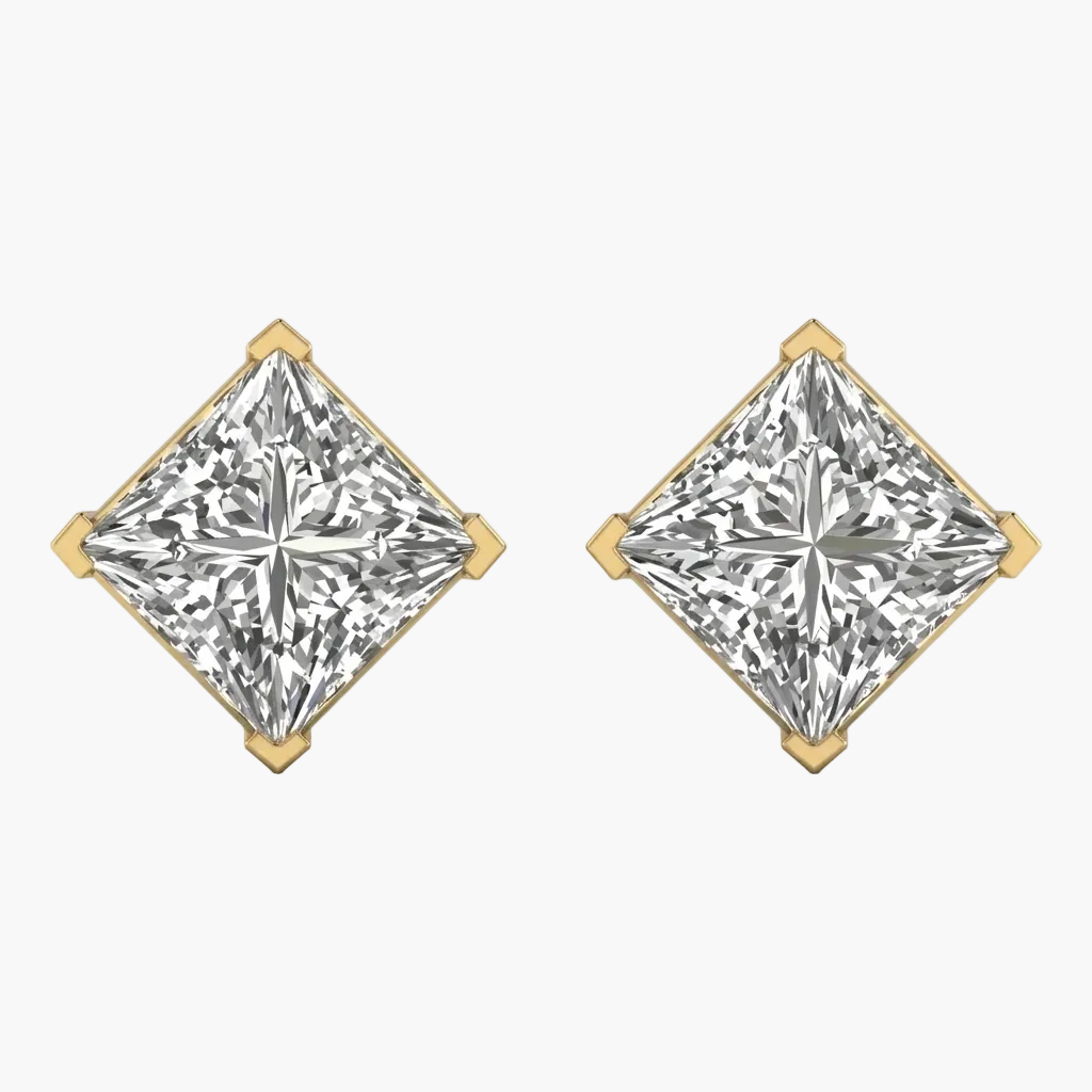Pair of diamond earrings with gold prongs on a white background