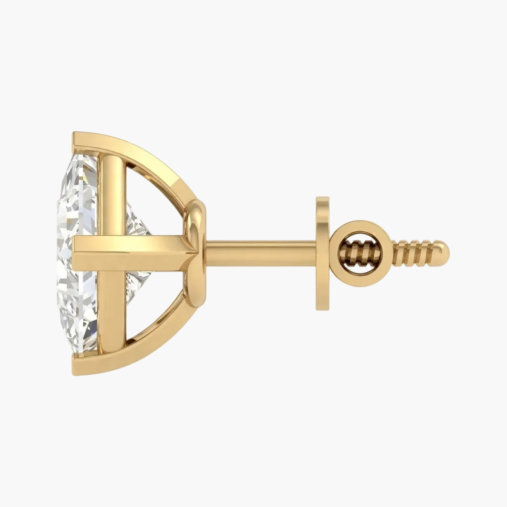 Gold earring with a clear gemstone on a white background