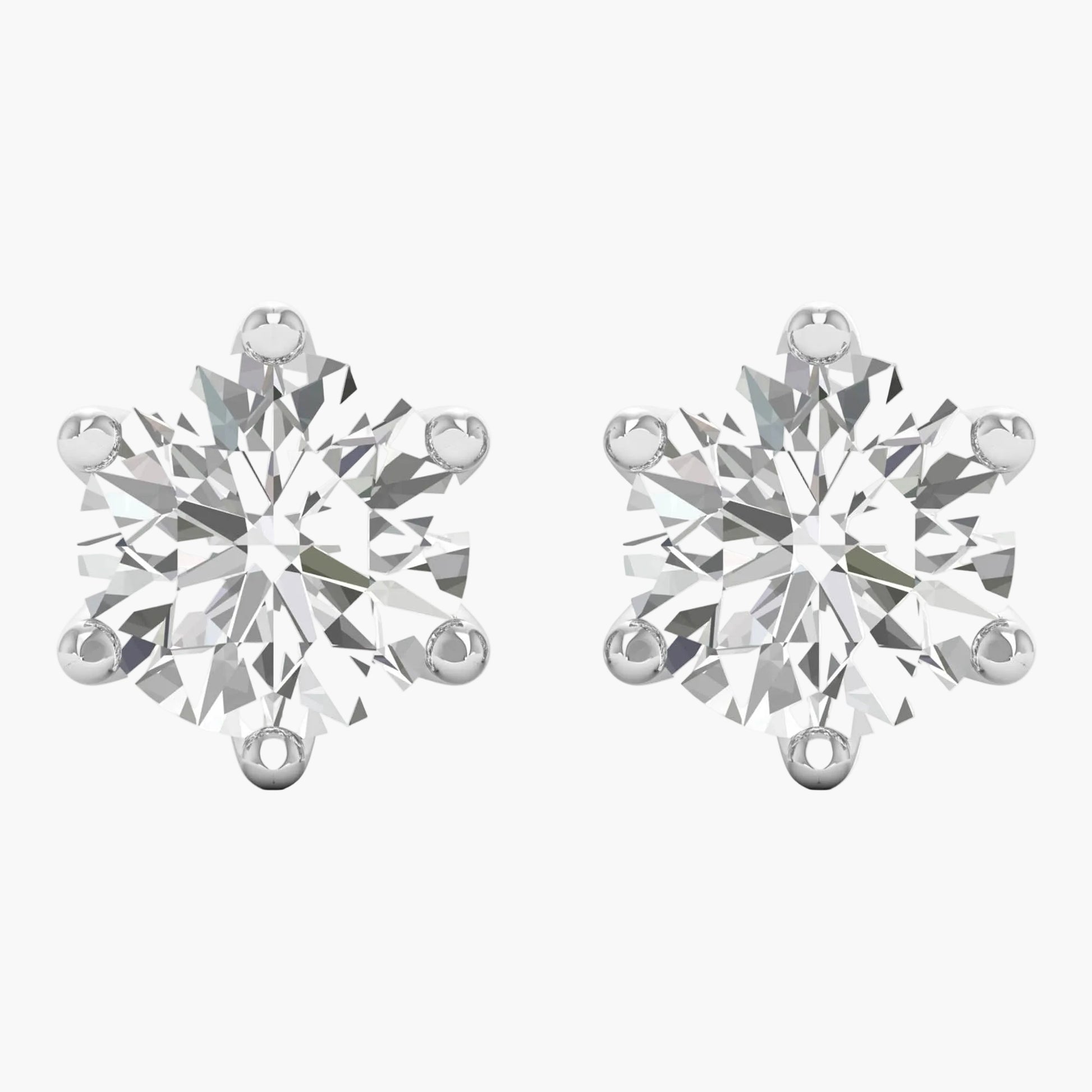Pair of diamond stud earrings on a white background