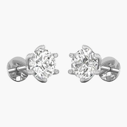 Pair of diamond stud earrings on a white background