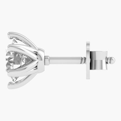 Silver earring on a white background