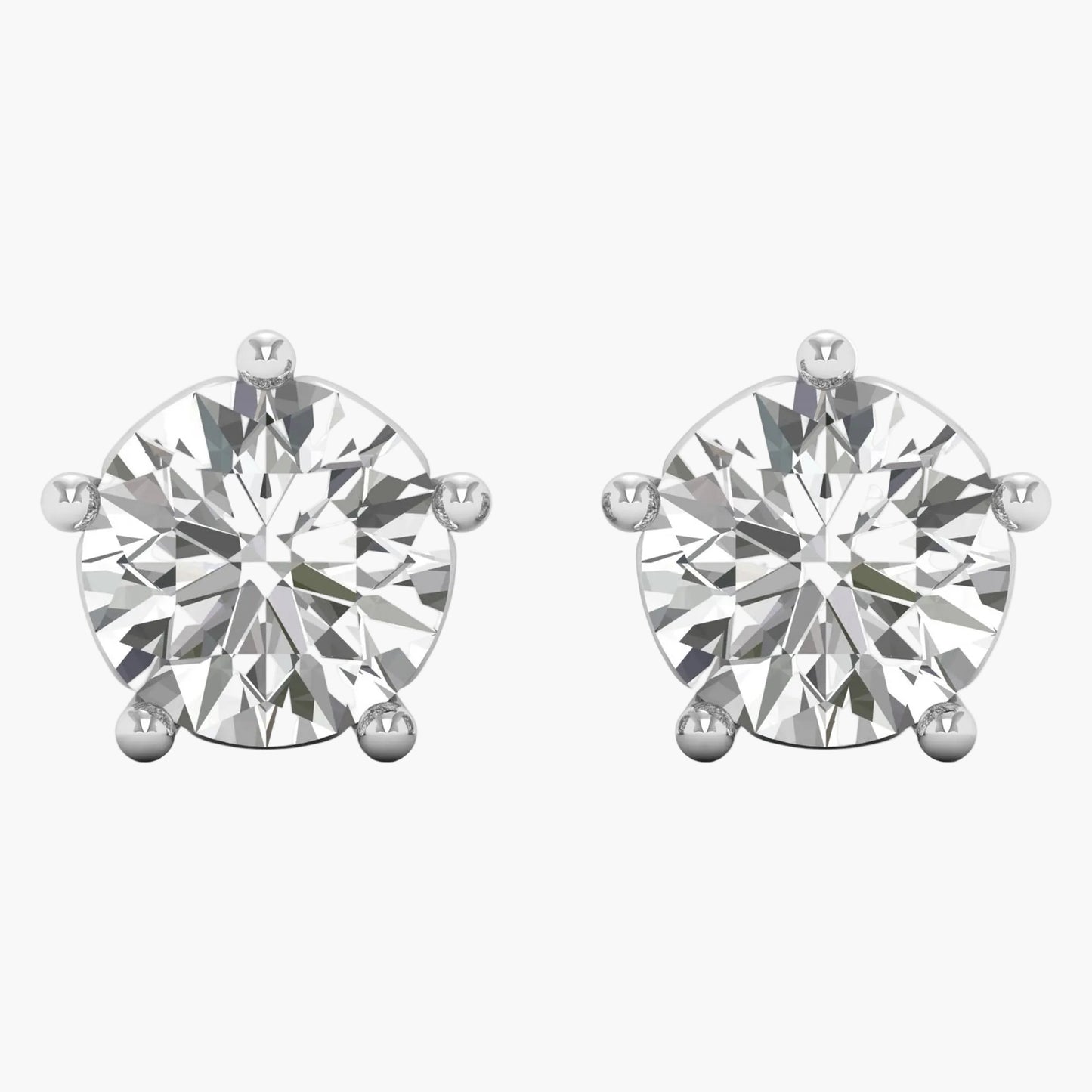 Pair of diamond stud earrings on a white background