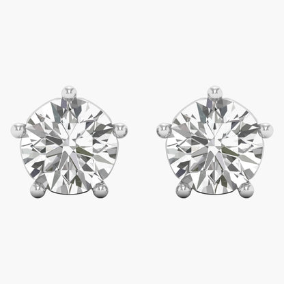 Pair of diamond stud earrings on a white background