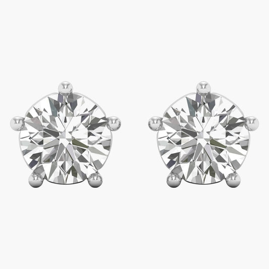 Pair of diamond stud earrings on a white background