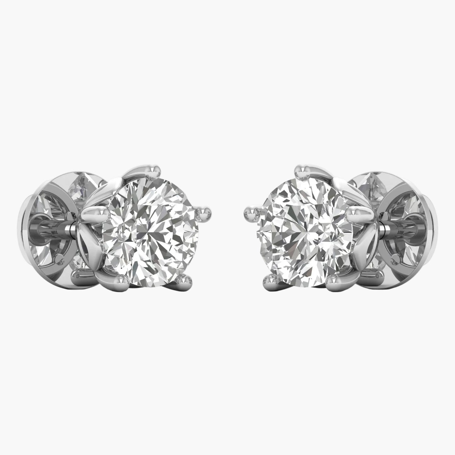 Pair of diamond stud earrings on a white background