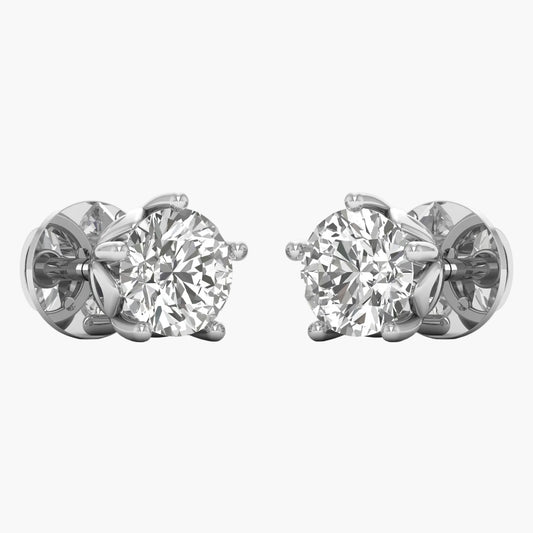 Pair of diamond stud earrings on a white background