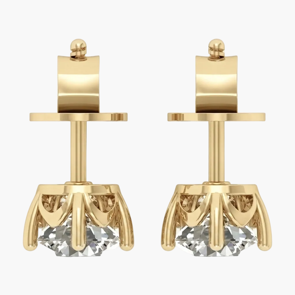 A pair of gold stud earrings with a geometric crown design and a clear faceted gemstone at the bottom, shown on a light gray background.