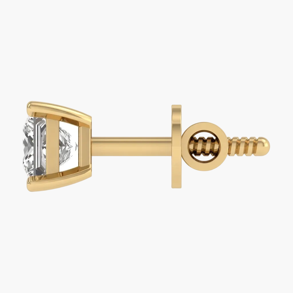 Gold earring with a diamond on a white background