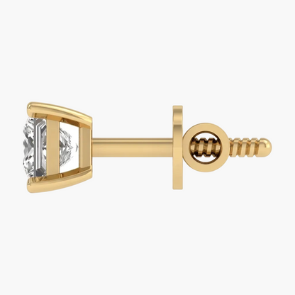 Gold earring with a diamond on a white background