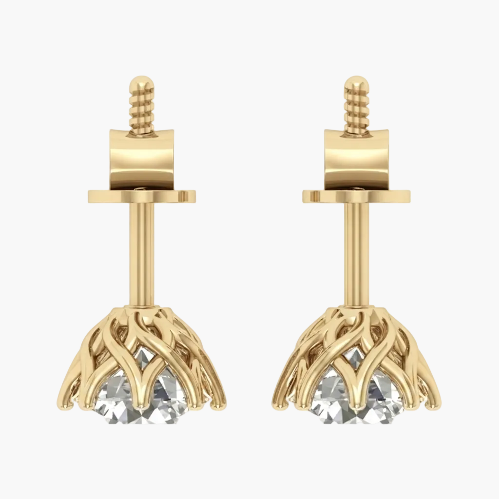 A pair of gold stud earrings with a floral or leaf-like openwork drop and a clear faceted gemstone at the bottom, shown on a plain white background.