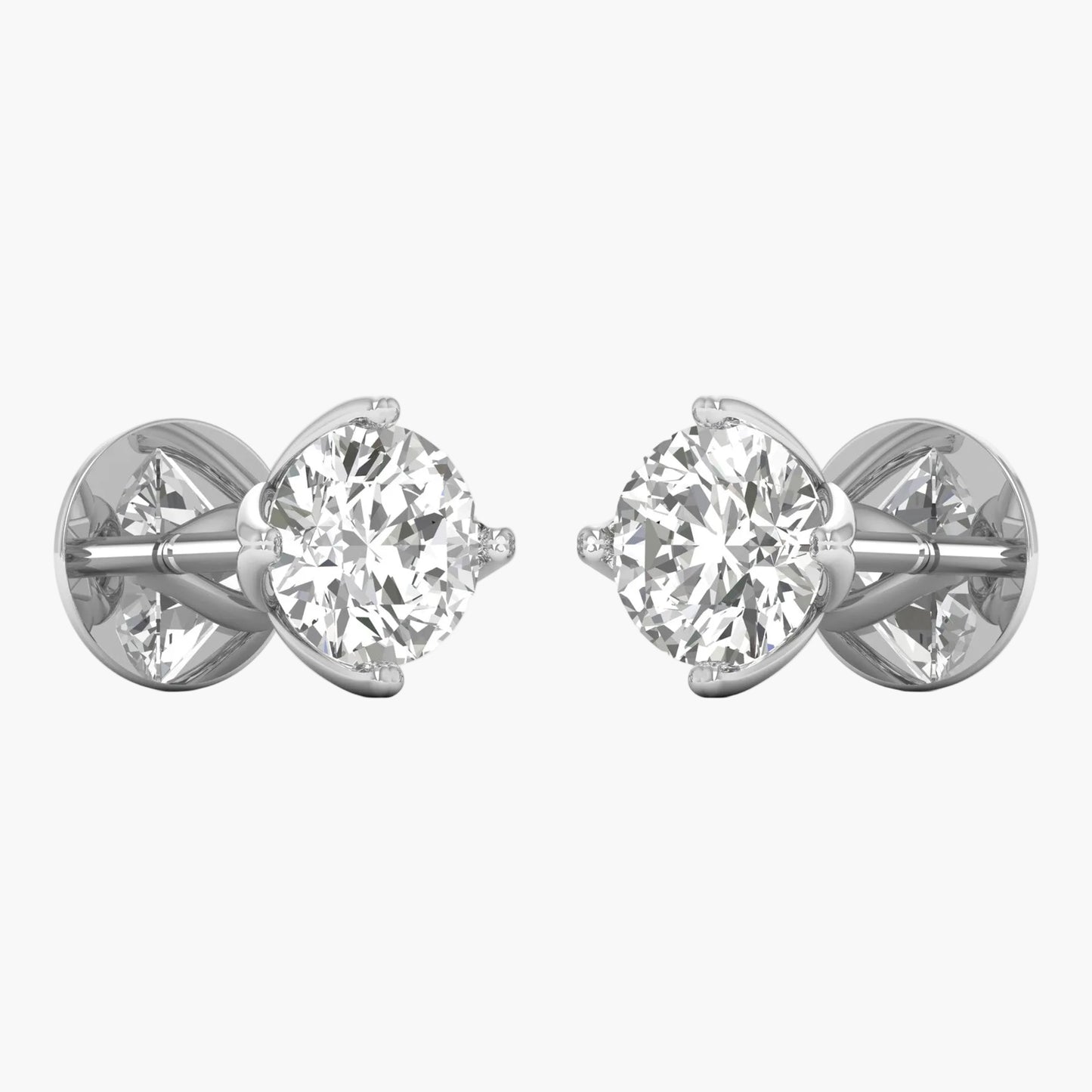 Pair of diamond stud earrings on a white background