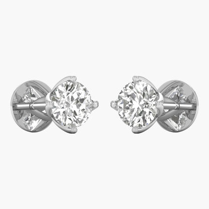 Pair of diamond stud earrings on a white background