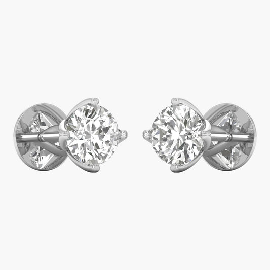 Pair of diamond stud earrings on a white background