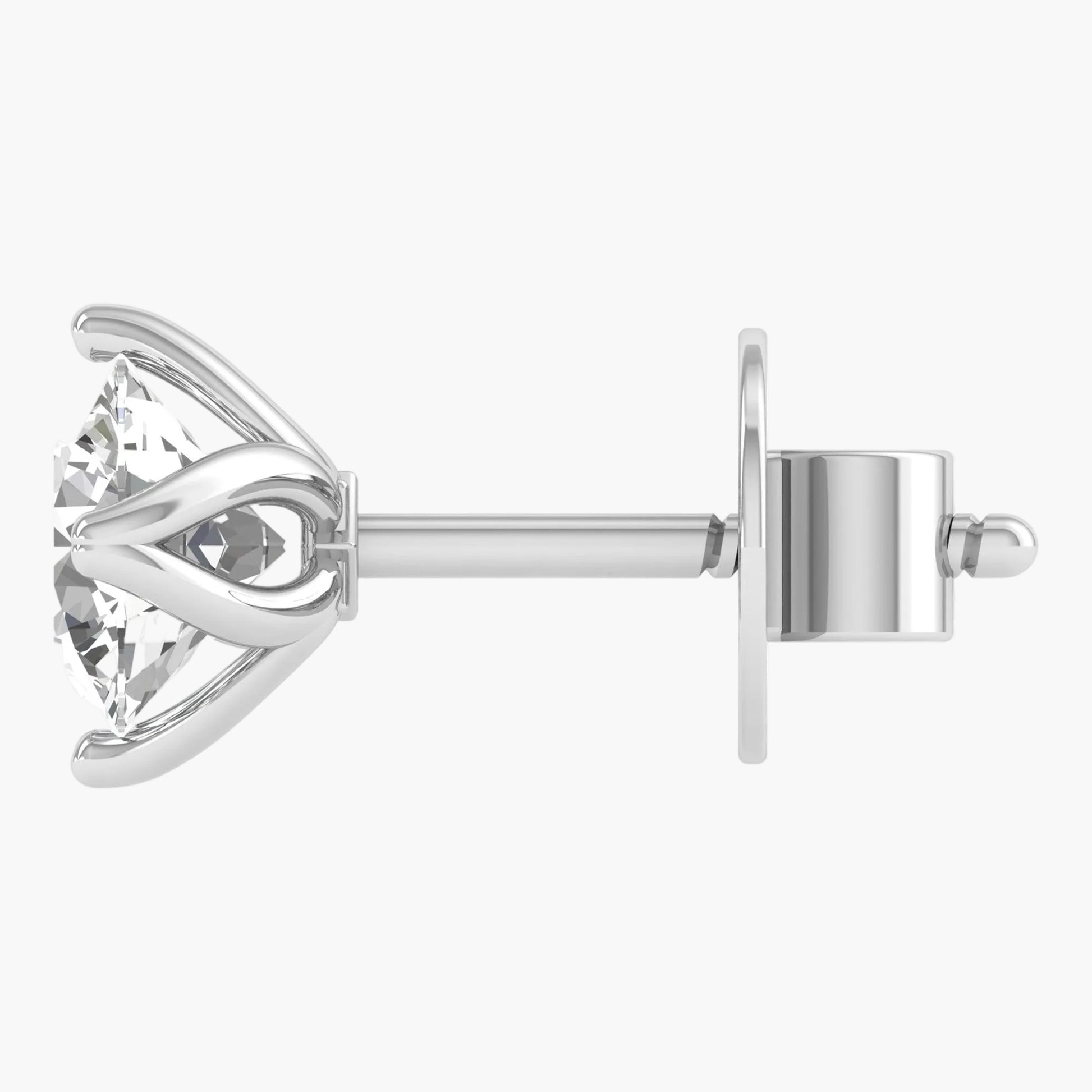 Silver earring with a clear gemstone on a white background