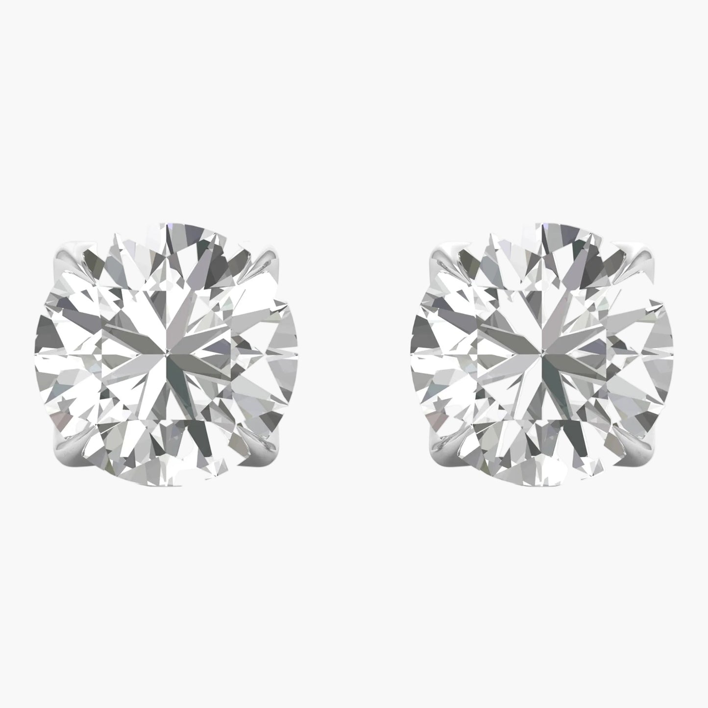 Pair of diamond stud earrings on a white background