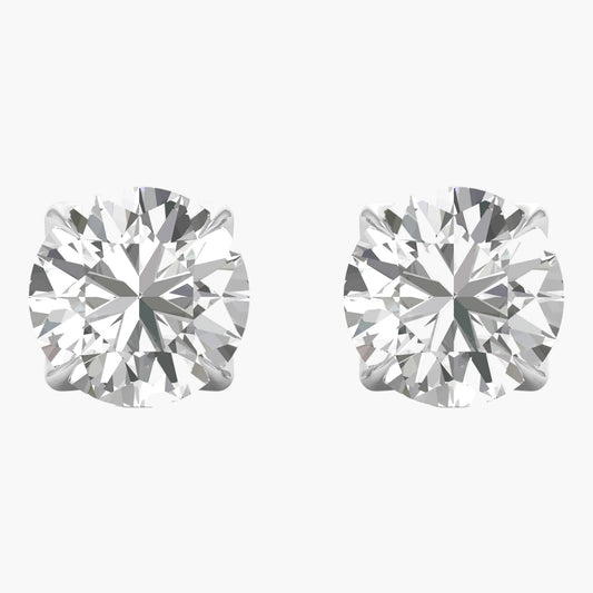 Pair of diamond stud earrings on a white background