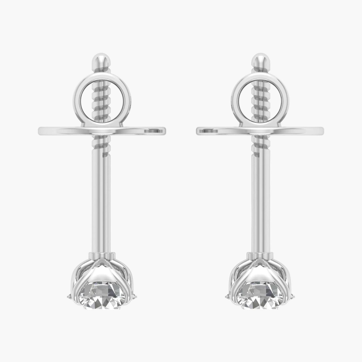 Pair of silver earrings with circular top and flower-like bottom on a white background