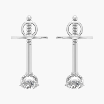 Pair of silver earrings with circular top and flower-like bottom on a white background