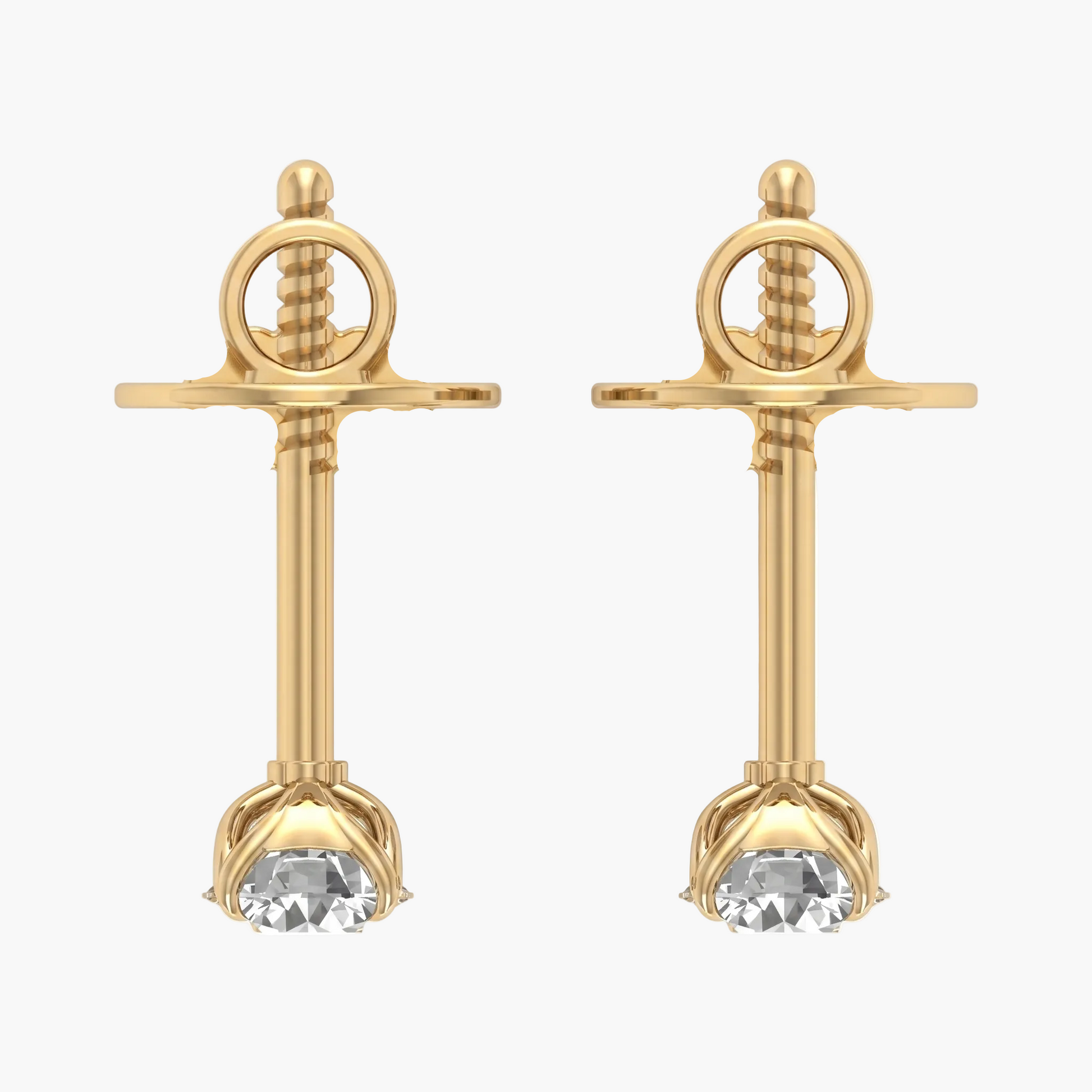 Gold earrings with clear gemstones on a white background