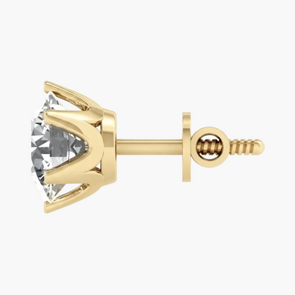 A single yellow gold stud earring featuring a large, round brilliant-cut clear gemstone in a prong setting, shown from a side profile view against a plain white background.