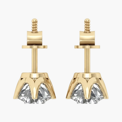 A pair of gold stud earrings with clear gemstones, shown on a plain white background.