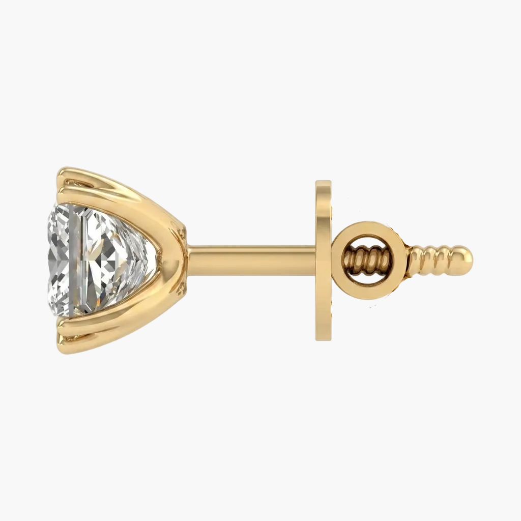 Gold earring with a clear gemstone on a white background