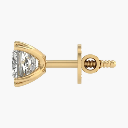 Gold earring with a clear gemstone on a white background