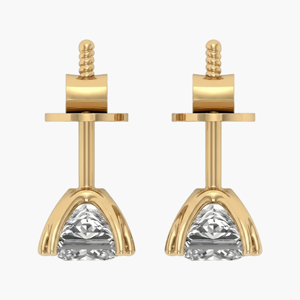 Gold earrings with clear gemstones on a white background