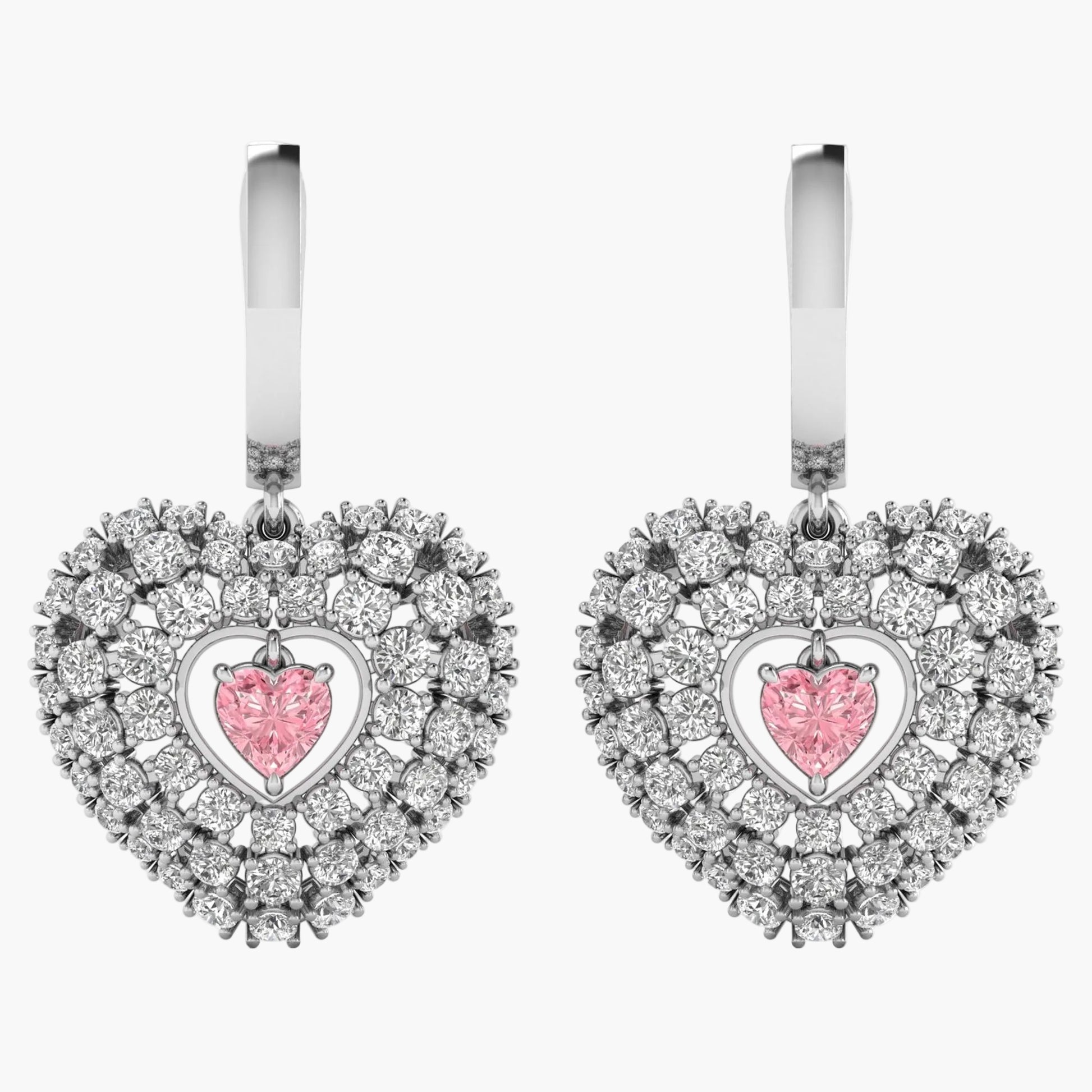 Heart-shaped earrings with pink gemstones on a white background