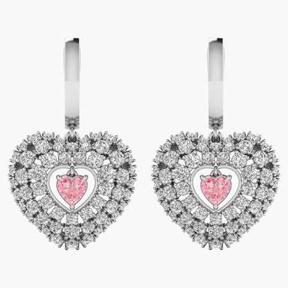 Heart-shaped earrings with pink gemstones on a white background