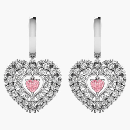 Heart-shaped earrings with pink gemstones on a white background