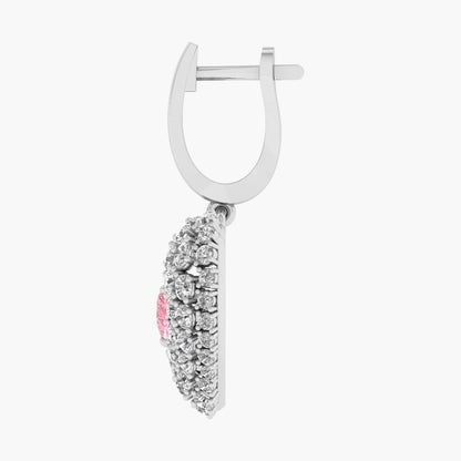 Silver earring with a pink gemstone on a white background