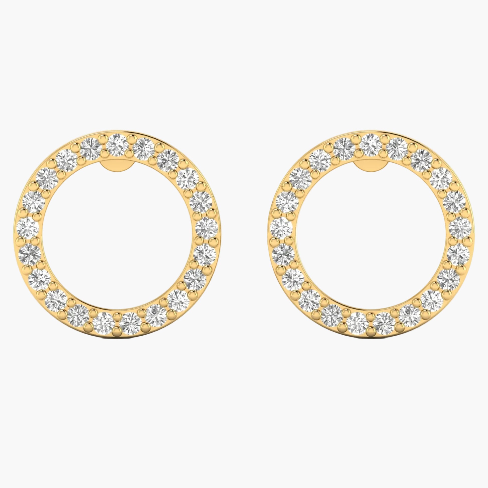 Gold hoop earrings with clear gemstones on a white background