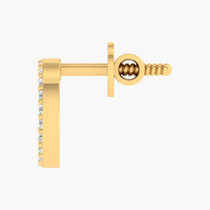 Gold earring with a screw-back on a white background