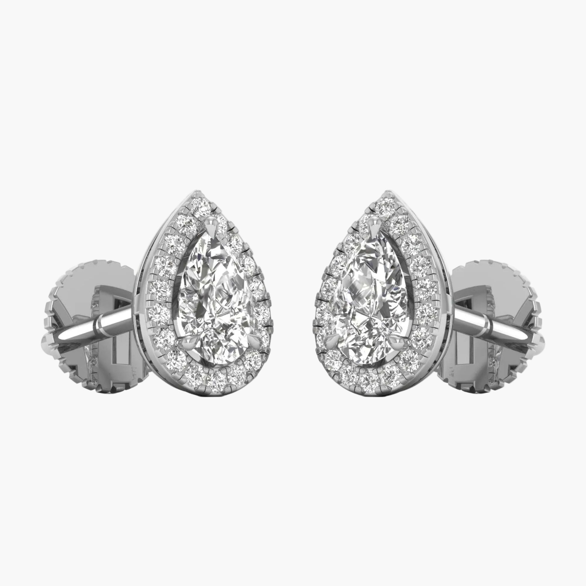 Pair of diamond earrings on a white background