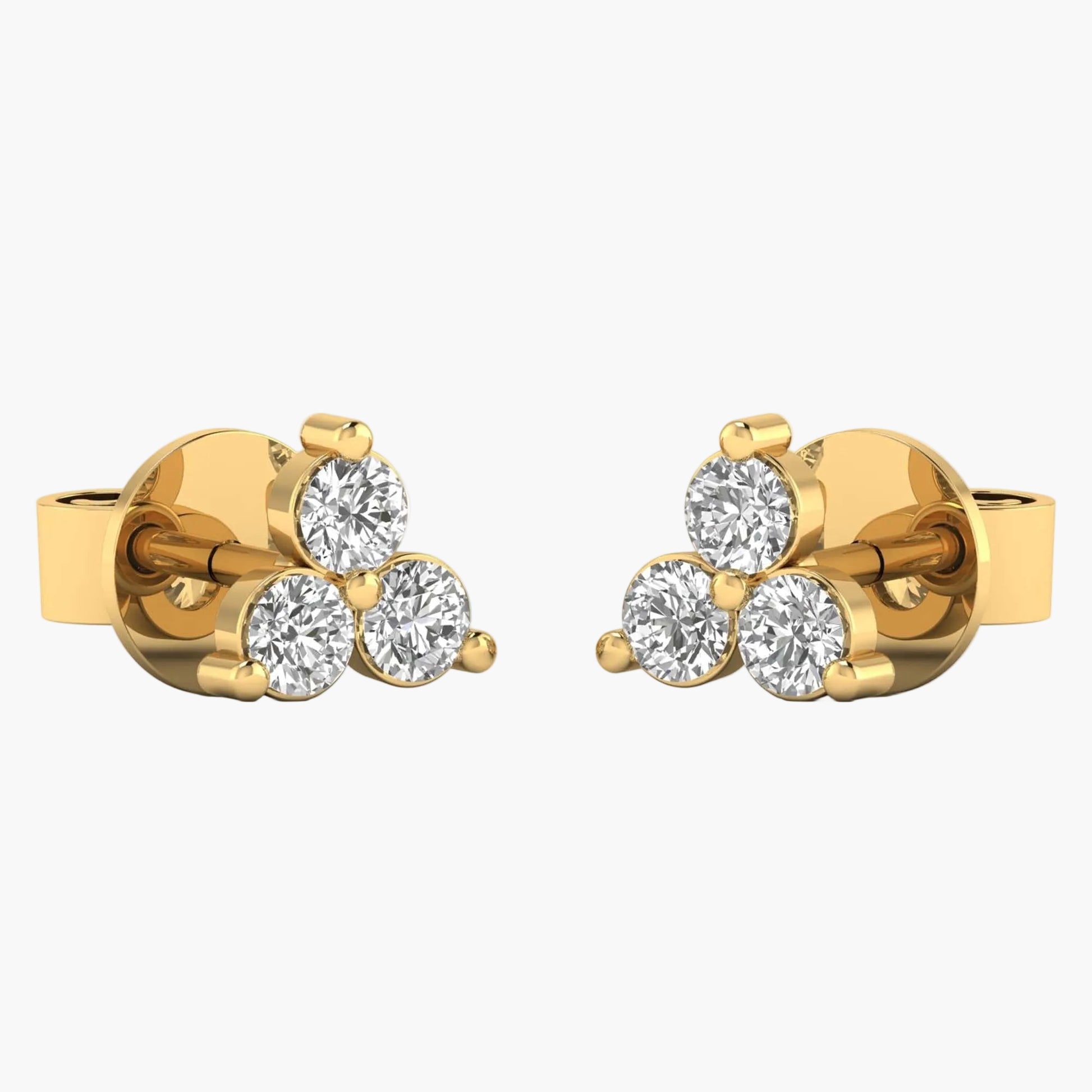 Gold earrings with four round diamonds on a white background