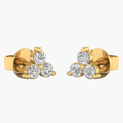 Gold earrings with four round diamonds on a white background