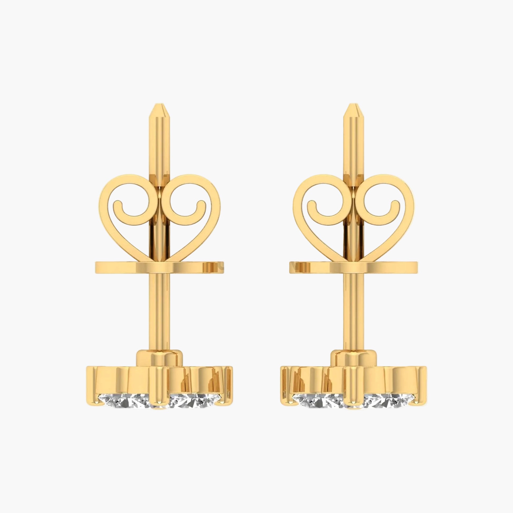 Gold earrings with decorative tops on a white background