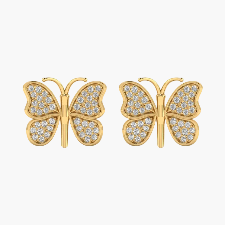 A pair of gold butterfly stud earrings paved with small clear stones, shown against a plain white background.