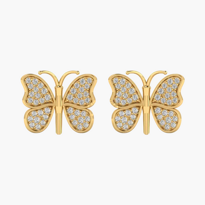 A pair of gold butterfly stud earrings paved with small clear stones, shown against a plain white background.