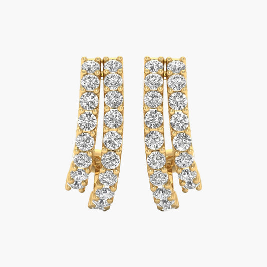 Gold hoop earrings with clear gemstones on a white background