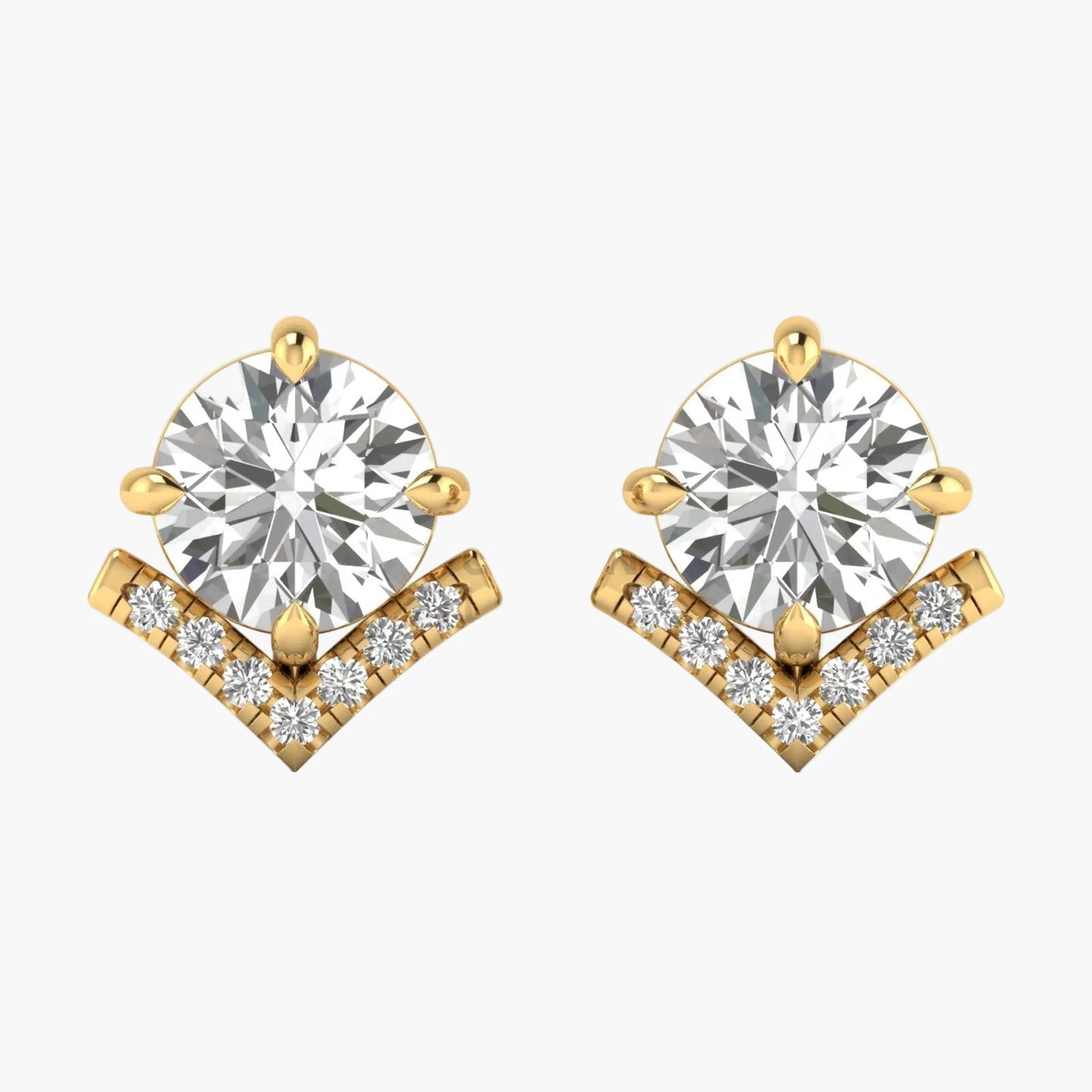 Gold earrings with clear gemstones on a white background