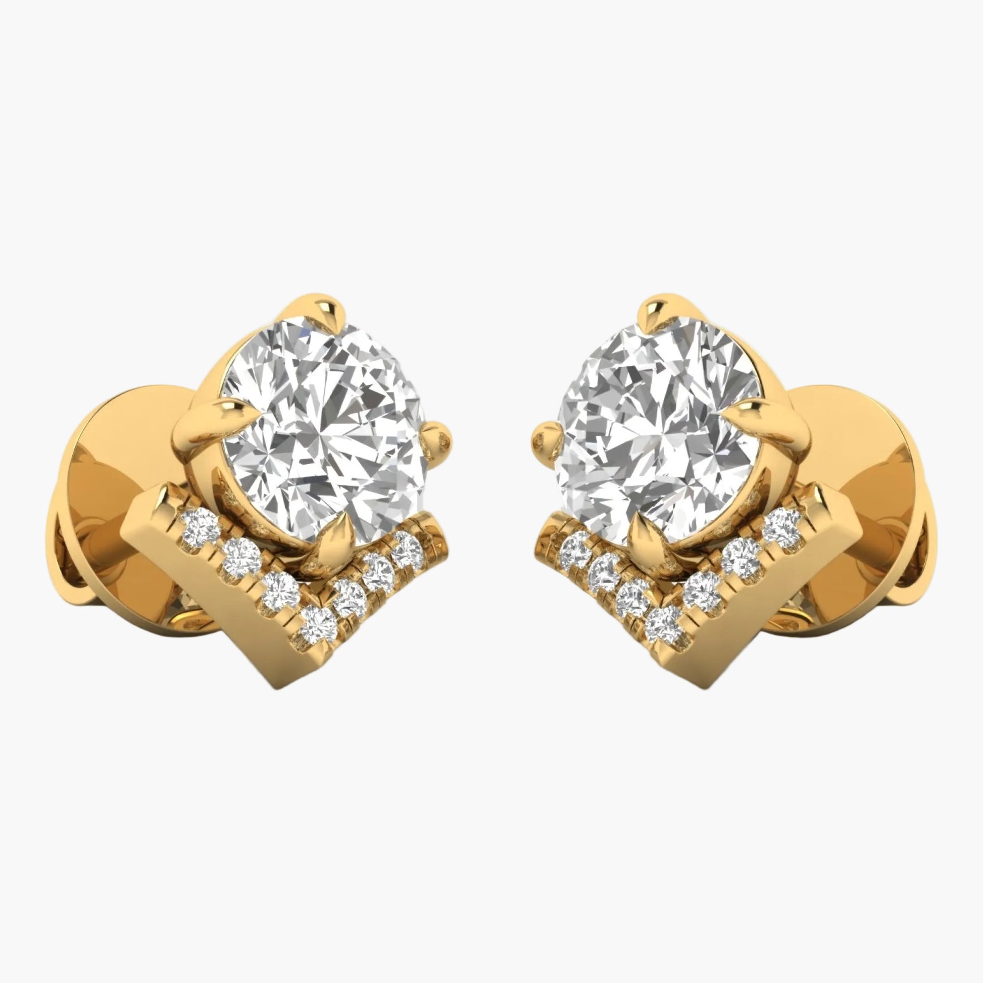 Gold earrings with large central gemstones and smaller diamonds on a white background