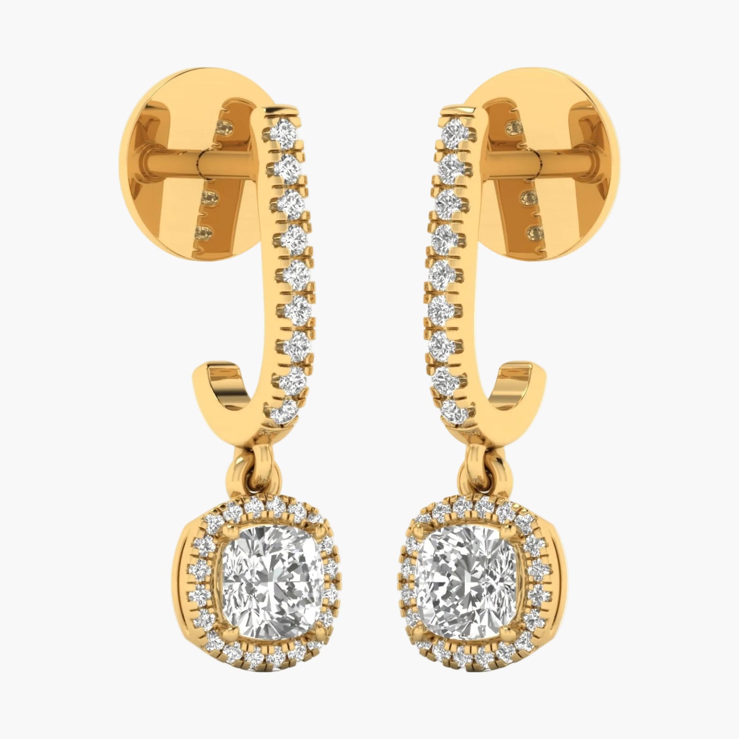 Gold hoop earrings with clear gemstones on a white background