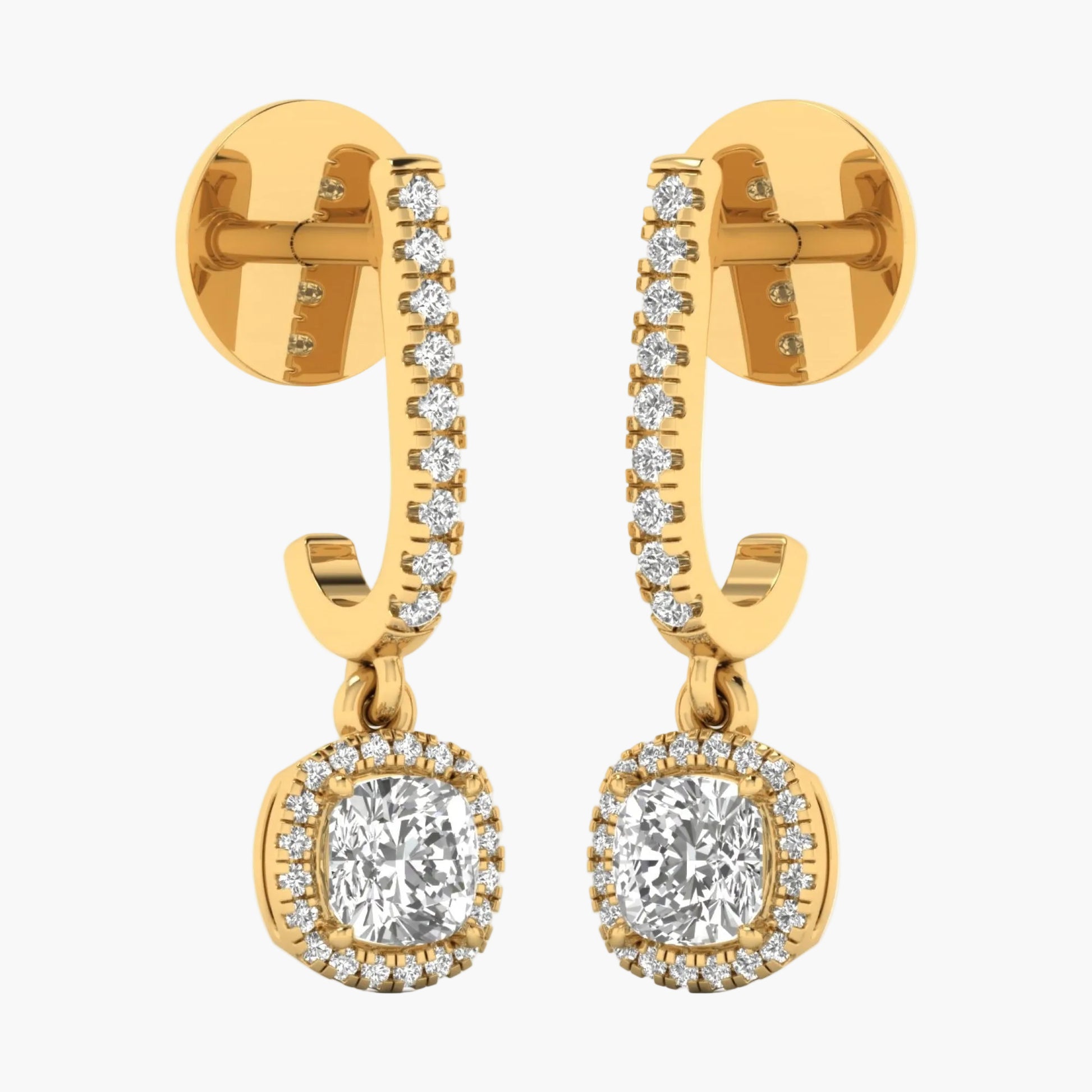 Gold hoop earrings with clear gemstones on a white background