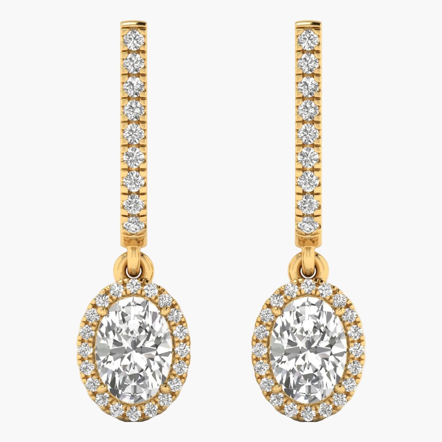 Gold earrings with large central gemstones and smaller stones on a white background