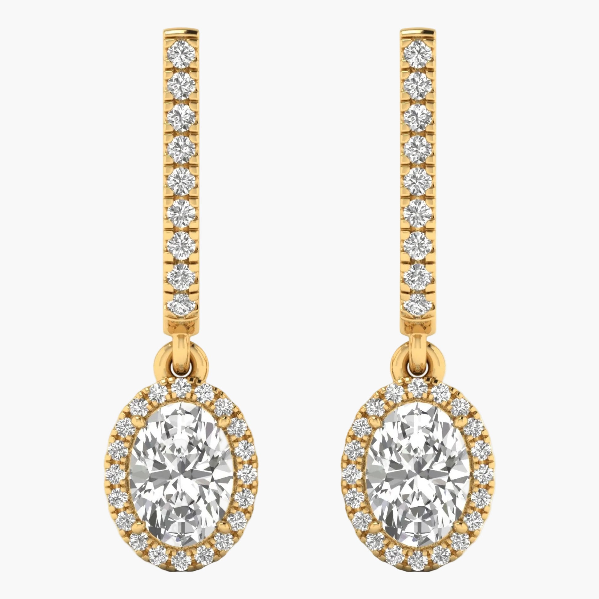 Gold earrings with large central gemstones and smaller stones on a white background